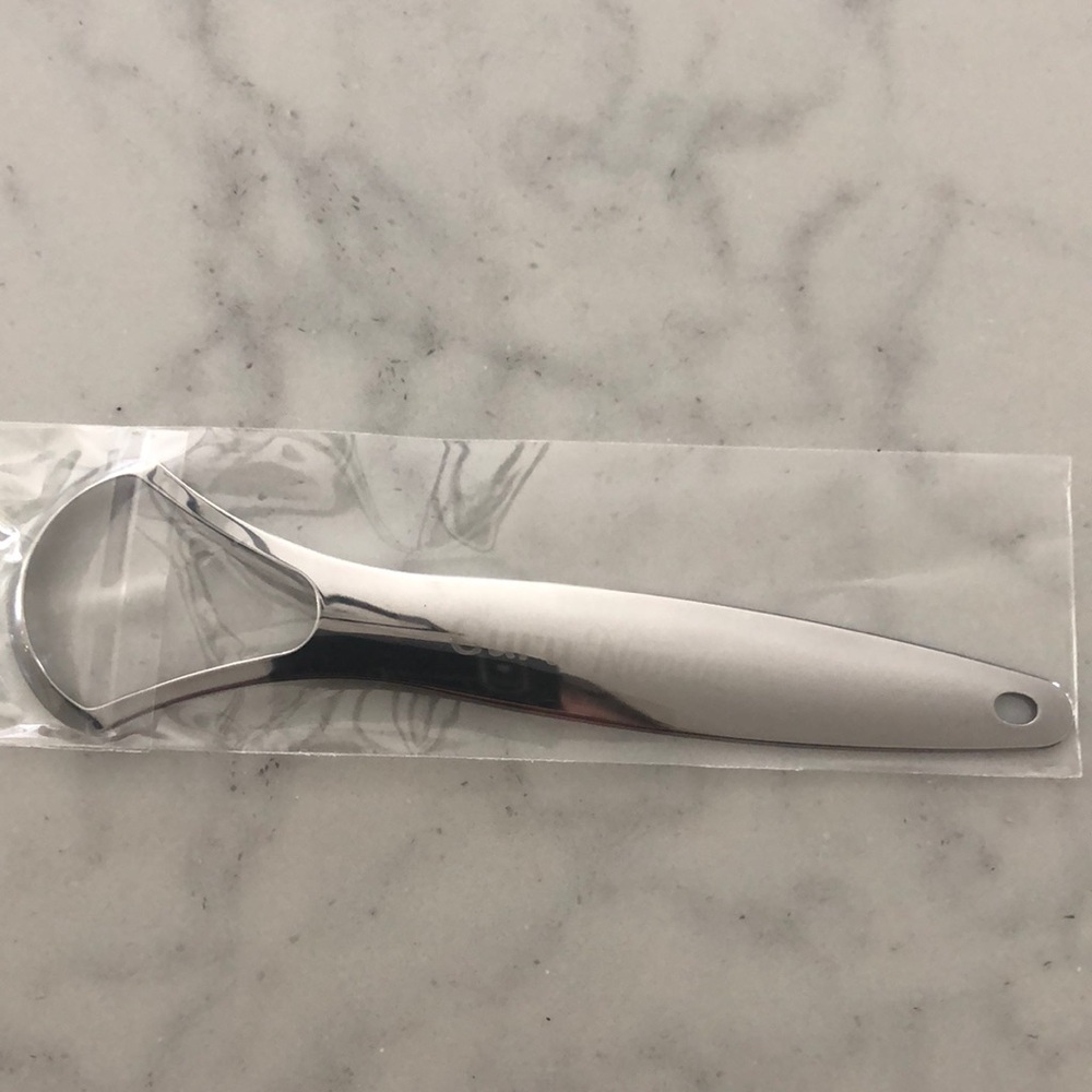 Guru Nanda Tongue Scrapper. Never opened. Silver.